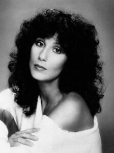 Cher headlines the Victoria’s Secret Fashion Show, celebrating her enduring legacy in fashion and music. Photo from the 1970s, WikiMedia, Public Domain.