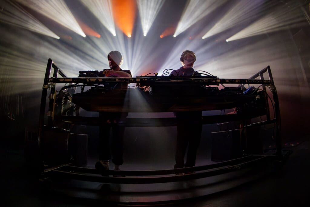The Norwegian duo Röyksopp delivering an electrifying DJ set at Vega, blending analogue synth magic with pulsing beats on their True Electric Tour.