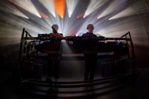 The Norwegian duo Röyksopp delivering an electrifying DJ set at Vega, blending analogue synth magic with pulsing beats on their True Electric Tour.